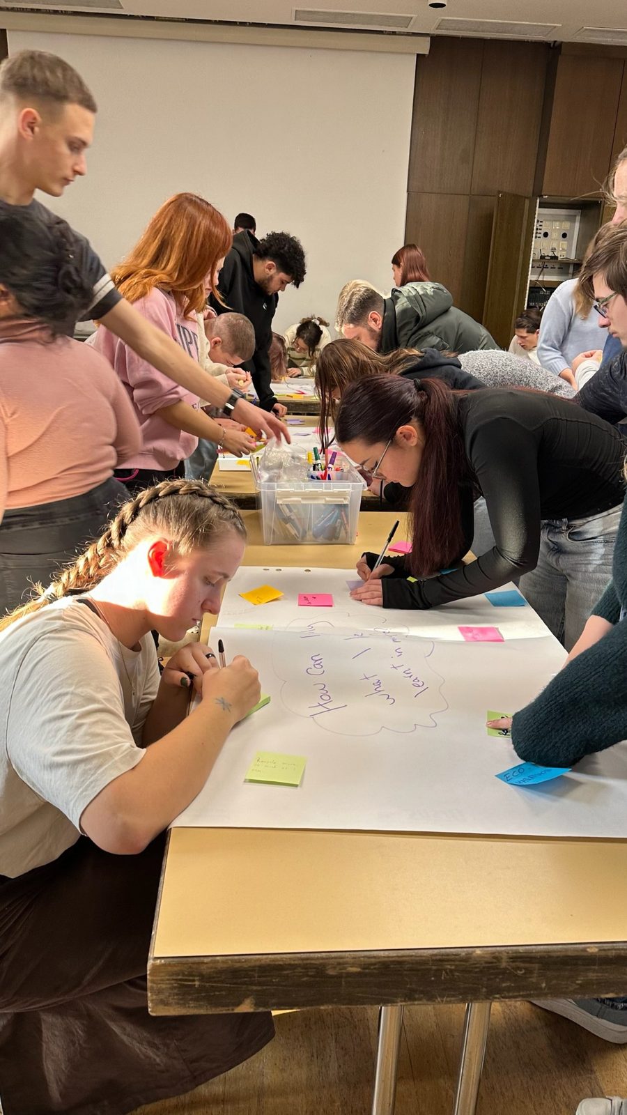 Participants writing down how they will use what they learnt